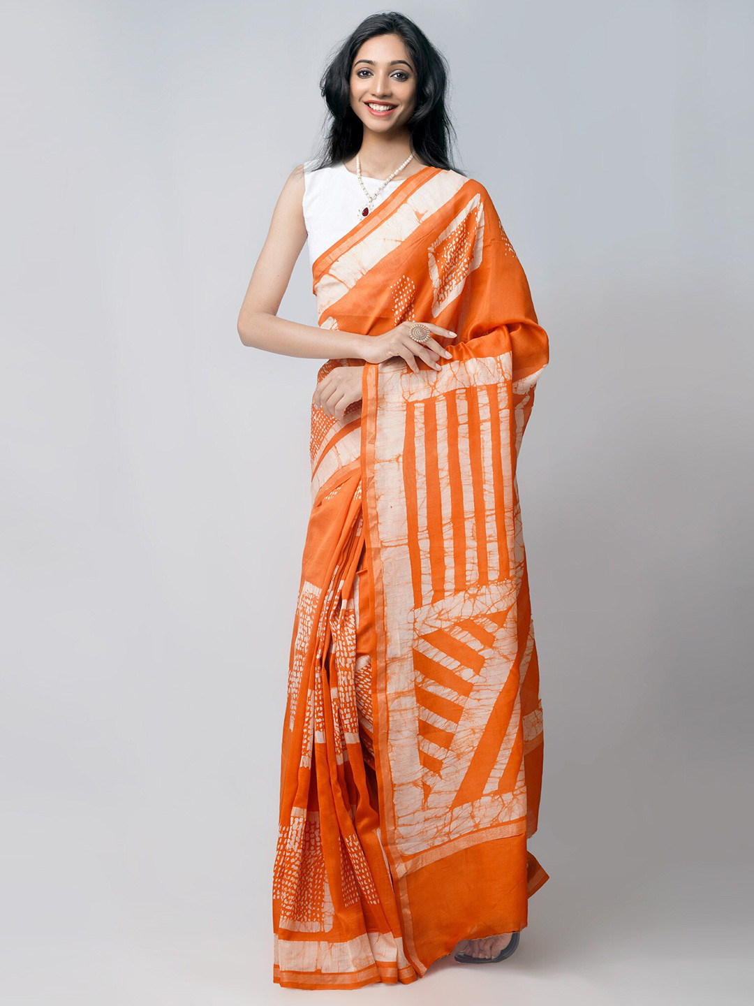 

Unnati Silks Orange & White Batik Zari Silk Cotton Chanderi Saree
