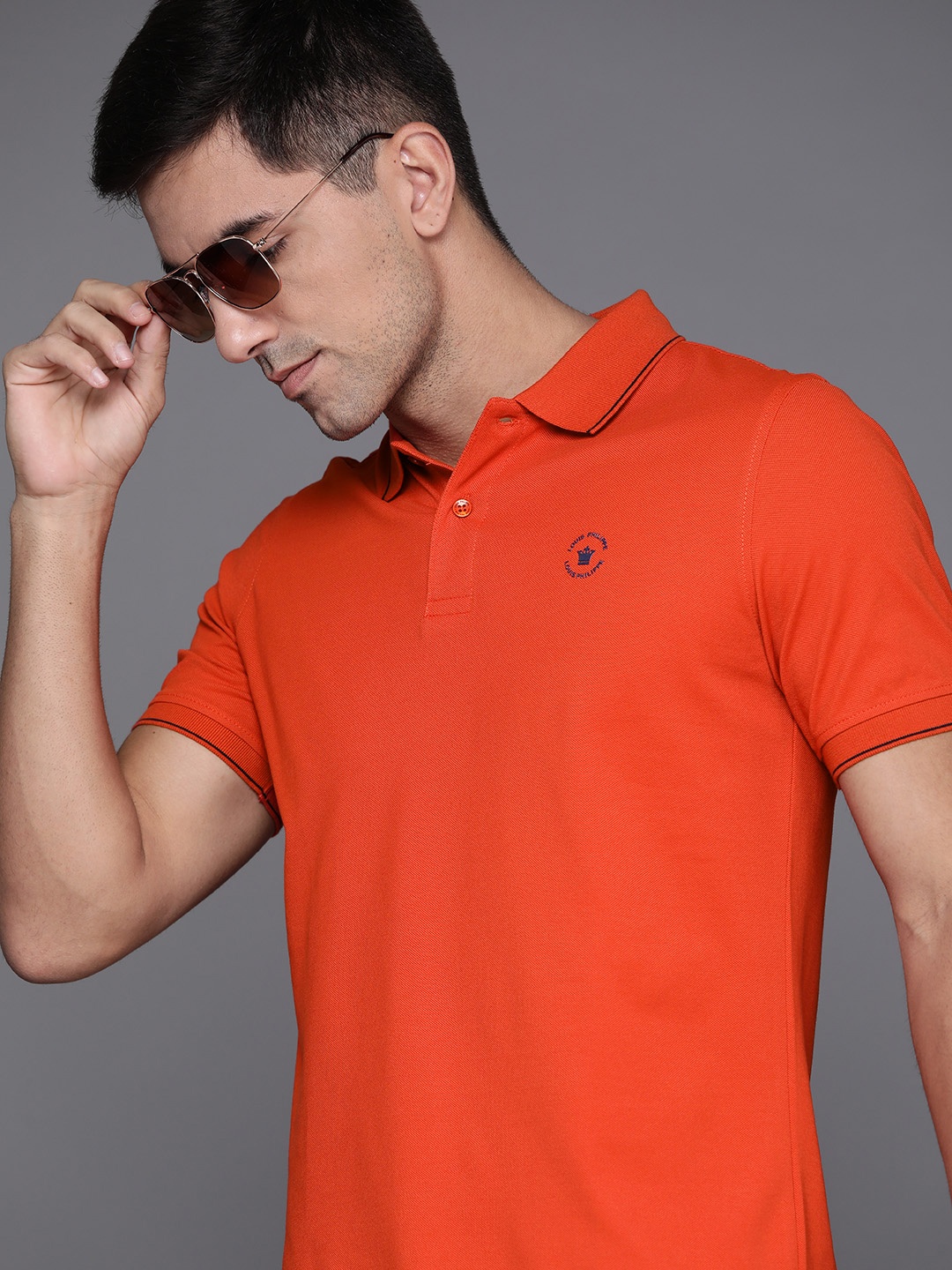 

Louis Philippe Men Orange Polo Collar T-shirt