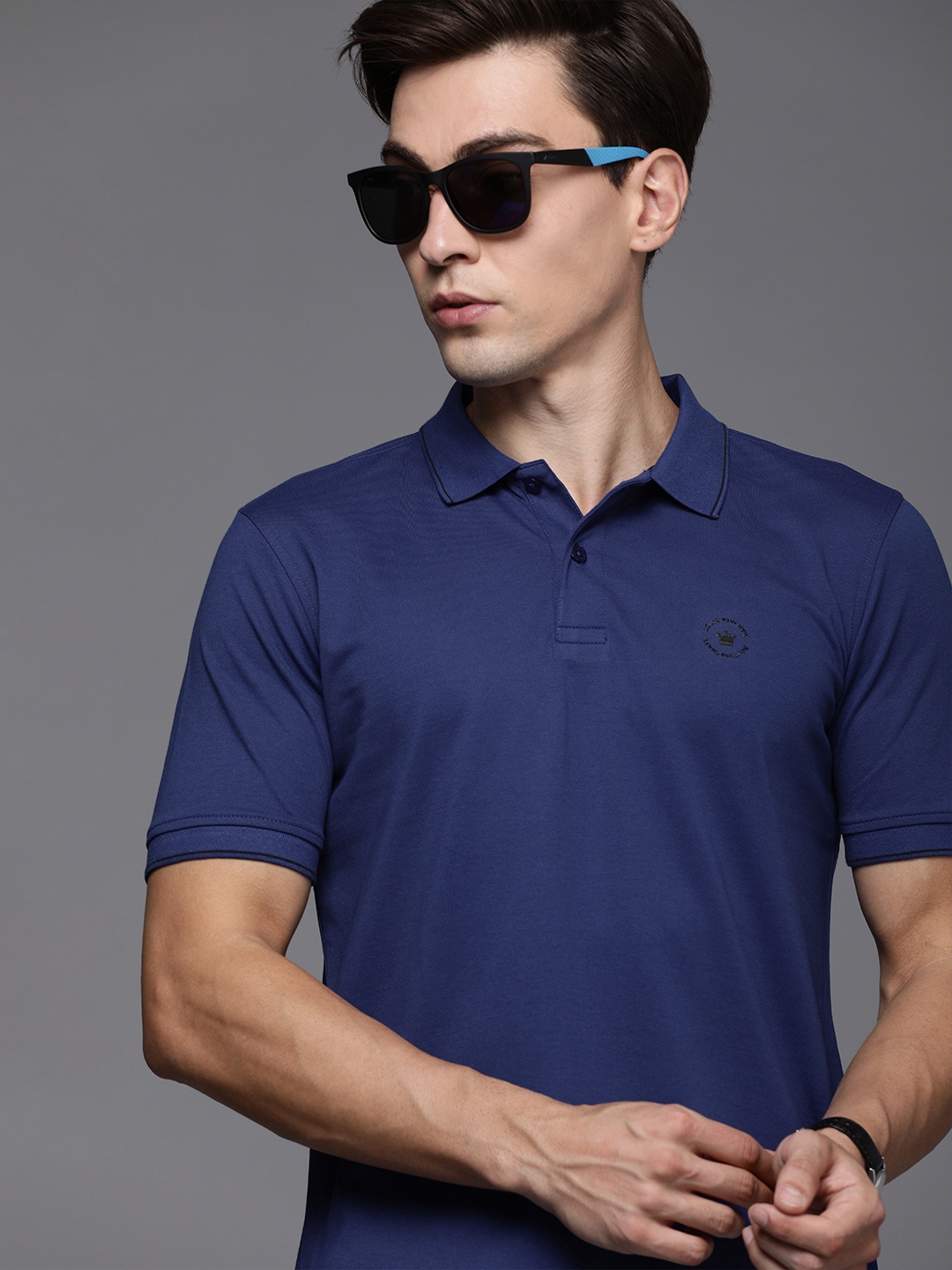 

Louis Philippe Men Blue Solid Polo Collar T-shirt