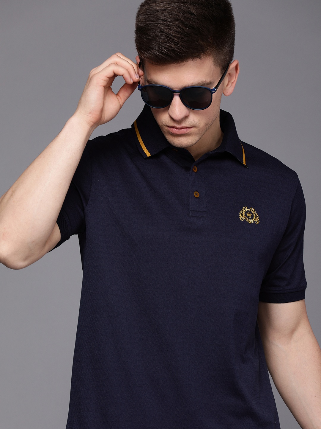 

Louis Philippe Men Navy Blue Self Design Polo Collar Pure Cotton T-shirt