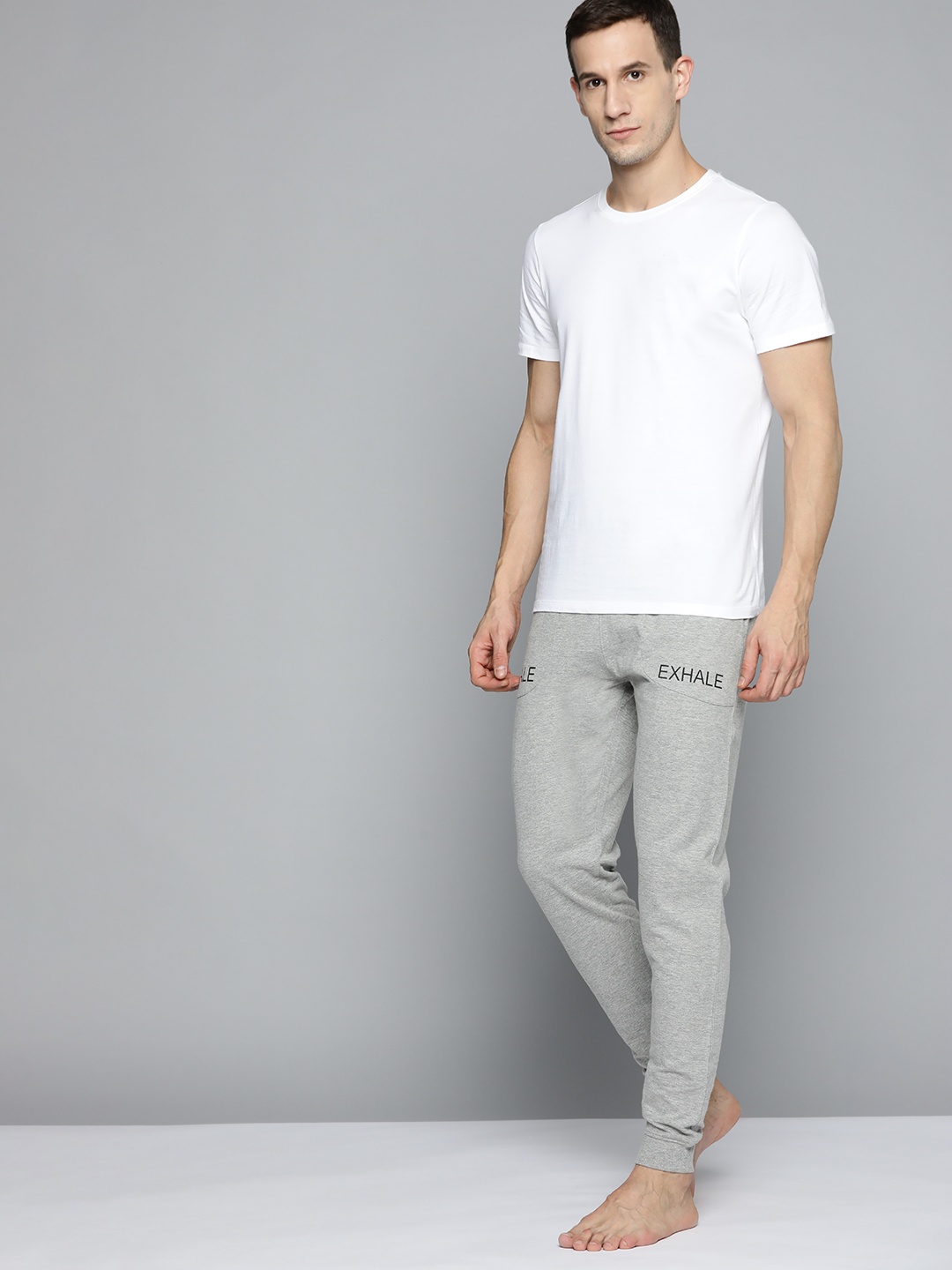 

HRX By Hrithik Roshan Yoga Men Grey Melange Solid Joggers