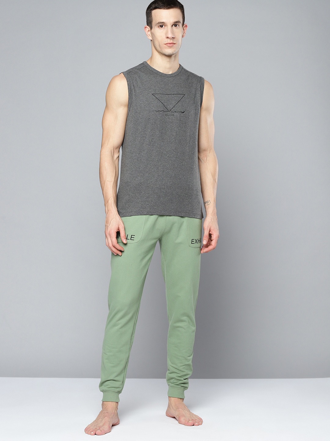 

HRX By Hrithik Roshan Yoga Men Jade Organic Cotton Solid Track Pants, Green
