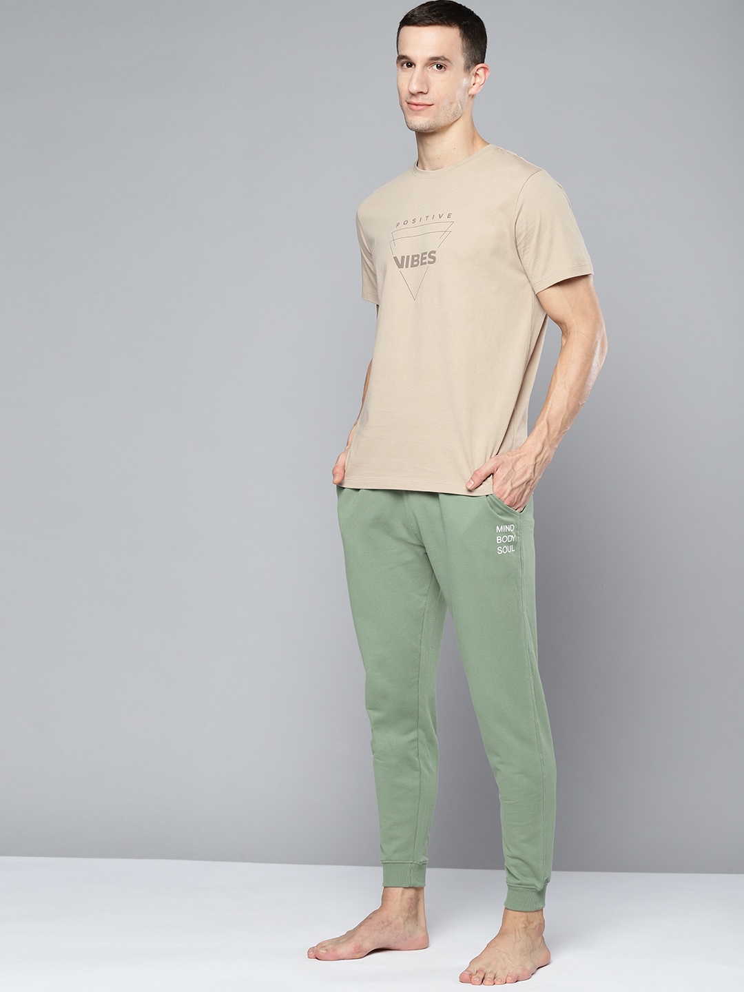 

HRX By Hrithik Roshan Yoga Men Jade Organic Cotton Solid Track Pants, Green