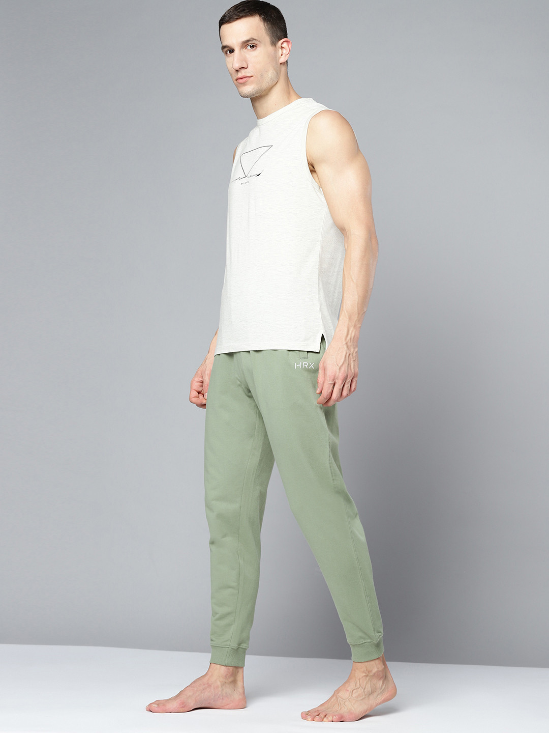 

HRX By Hrithik Roshan Yoga Men Jade Organic Cotton Solid Track Pants, Green