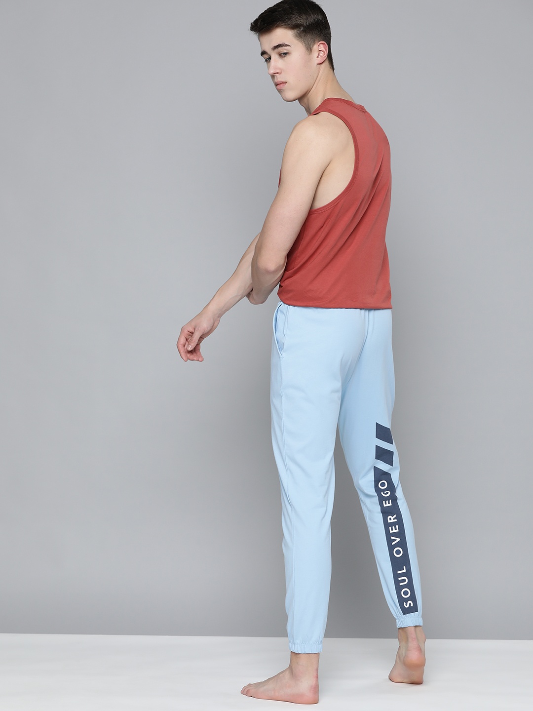 

HRX By Hrithik Roshan Men Printed Slim Fit Cotton Yoga Sustainable Joggers, Blue
