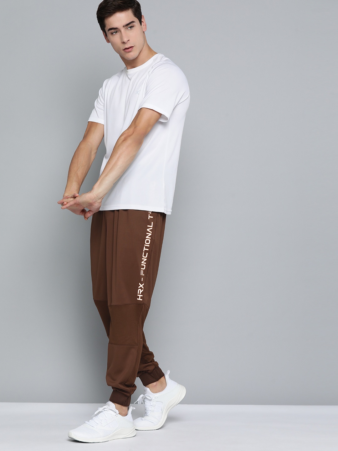 

HRX By Hrithik Roshan Training Men Rapid-Dry Solid Joggers, Brown