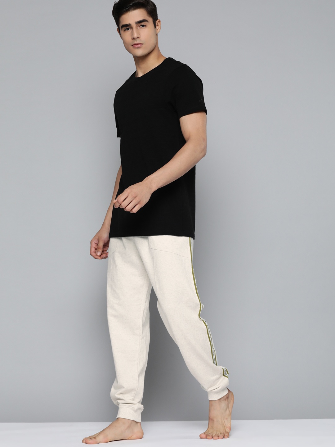 

HRX by Hrithik Roshan Men Cream-Coloured Pure Cotton Solid Joggers
