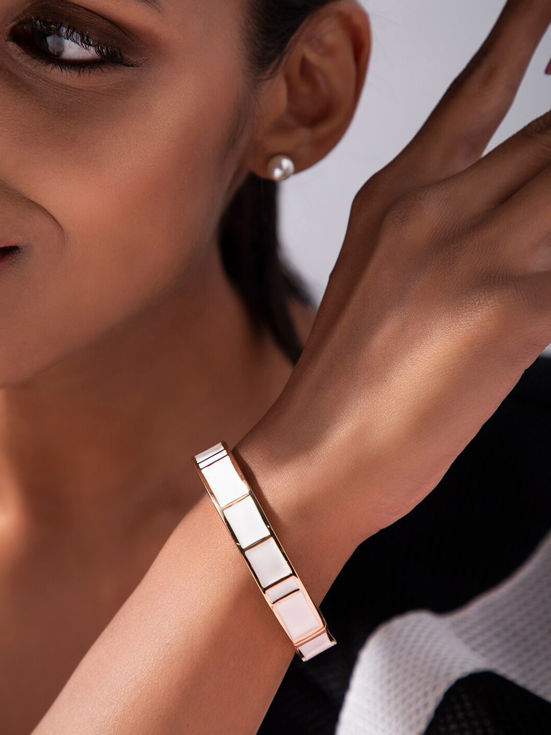 

Rubans Voguish Women Gold-Plated & White Bangle-Style Bracelet