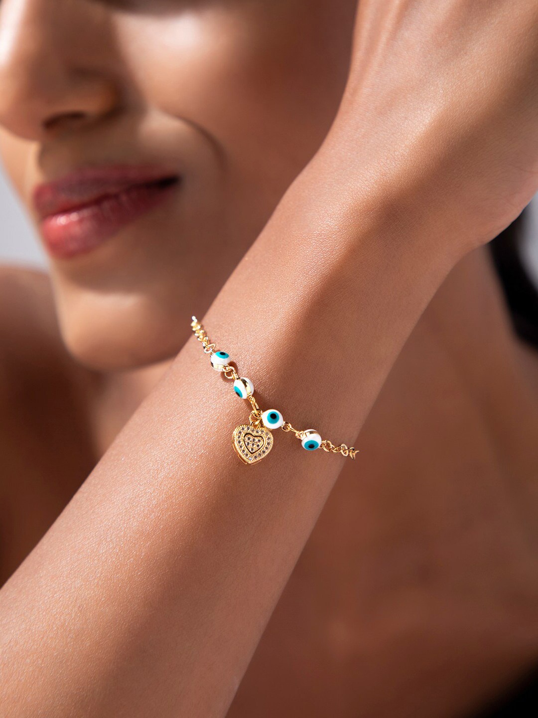 

Rubans Voguish Women Gold-Plated Blue & White Evil Eye Charm Bracelet