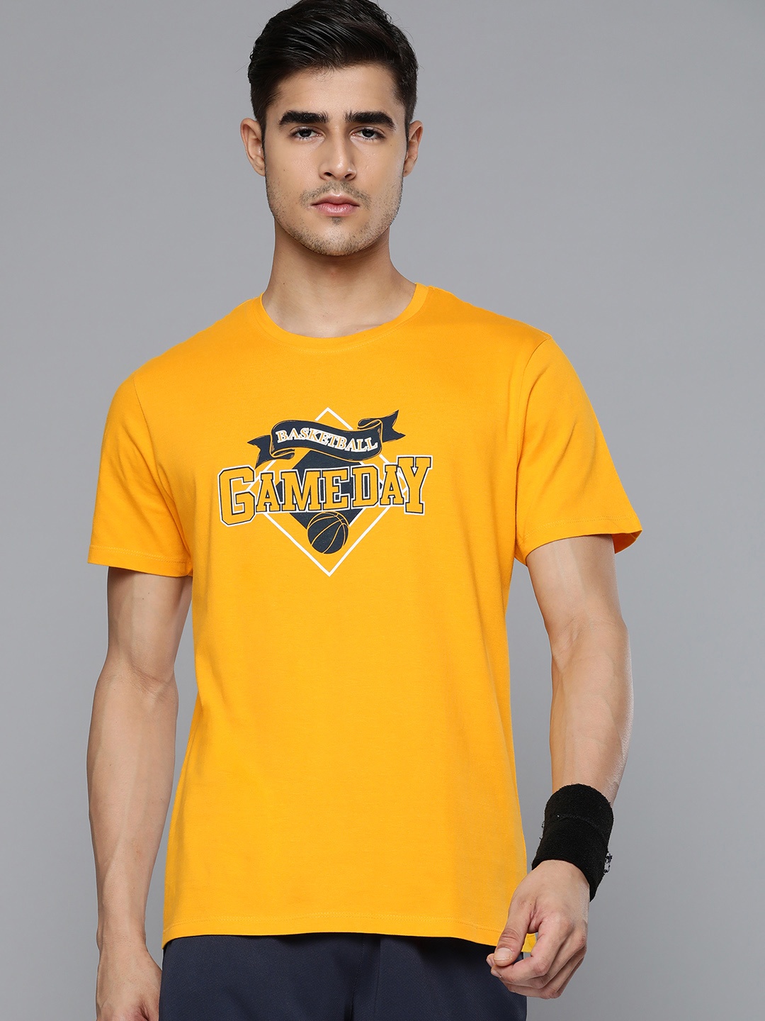 

HRX By Hrithik Roshan Basketball Men Gold Fusion Bio-Wash Graphic Tshirt, Yellow