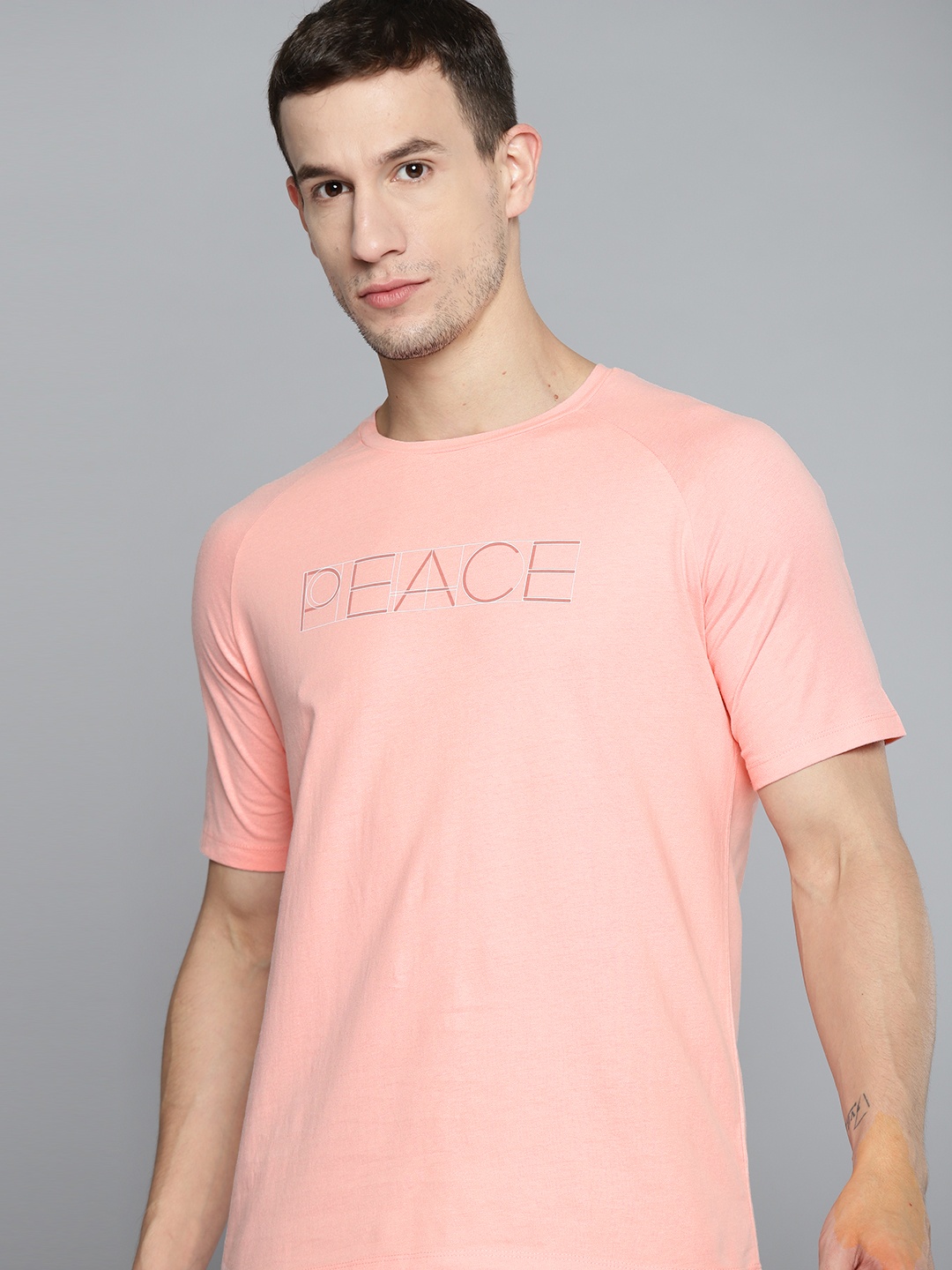 

HRX By Hrithik Roshan Yoga Men QUARTZ PINK Organic Cotton solid Sustainable Tshirts, Peach