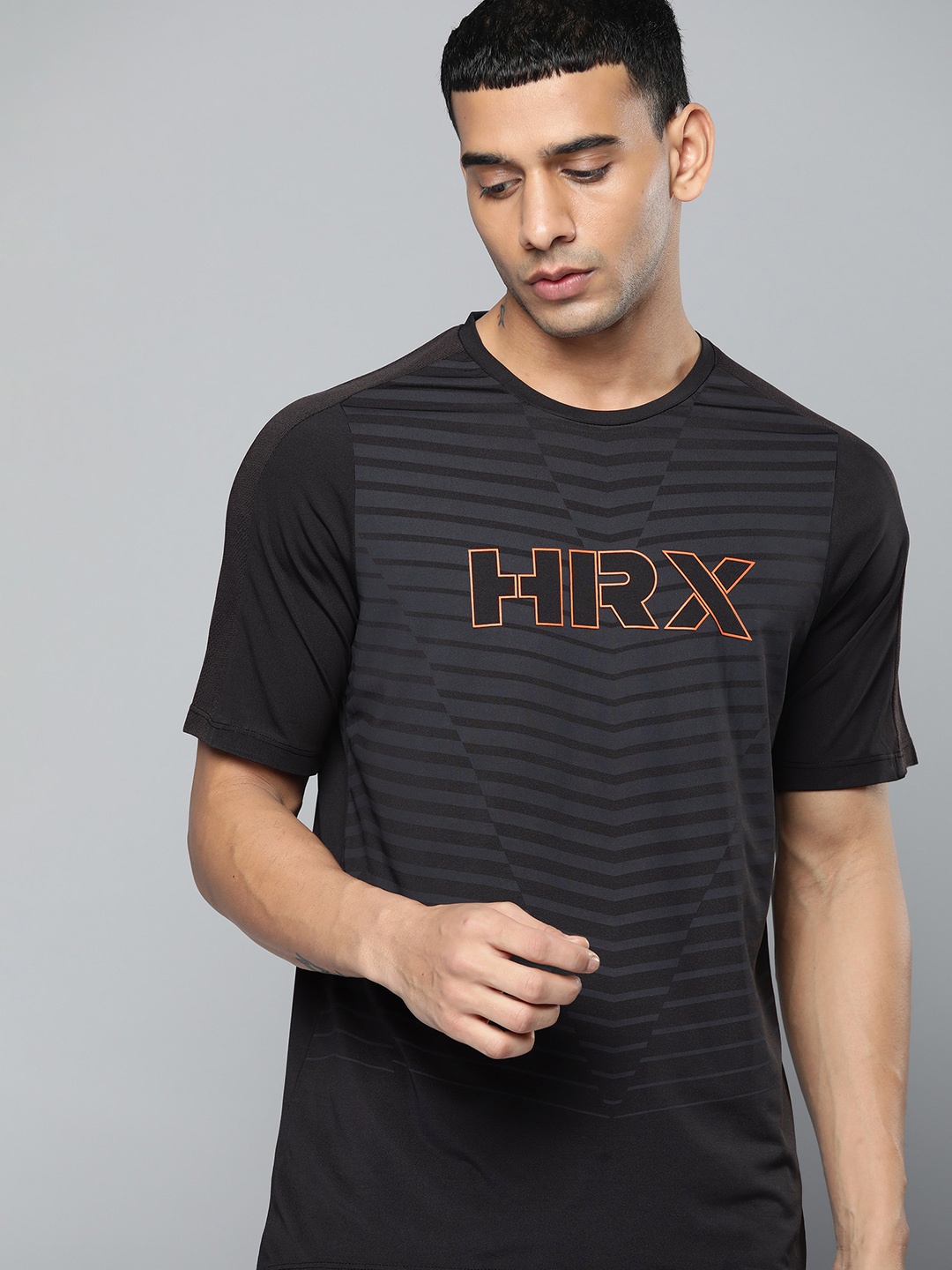 

HRX By Hrithik Roshan Men Jet Black Rapid-Dry Brand Carrier Training T-shirt