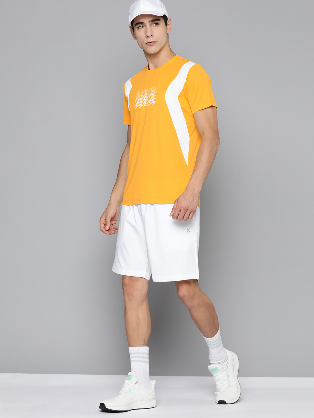 

HRX by Hrithik Roshan Men Printed Rapid-Dry Antimicrobial Finish Racket Sport T-shirt, Mustard