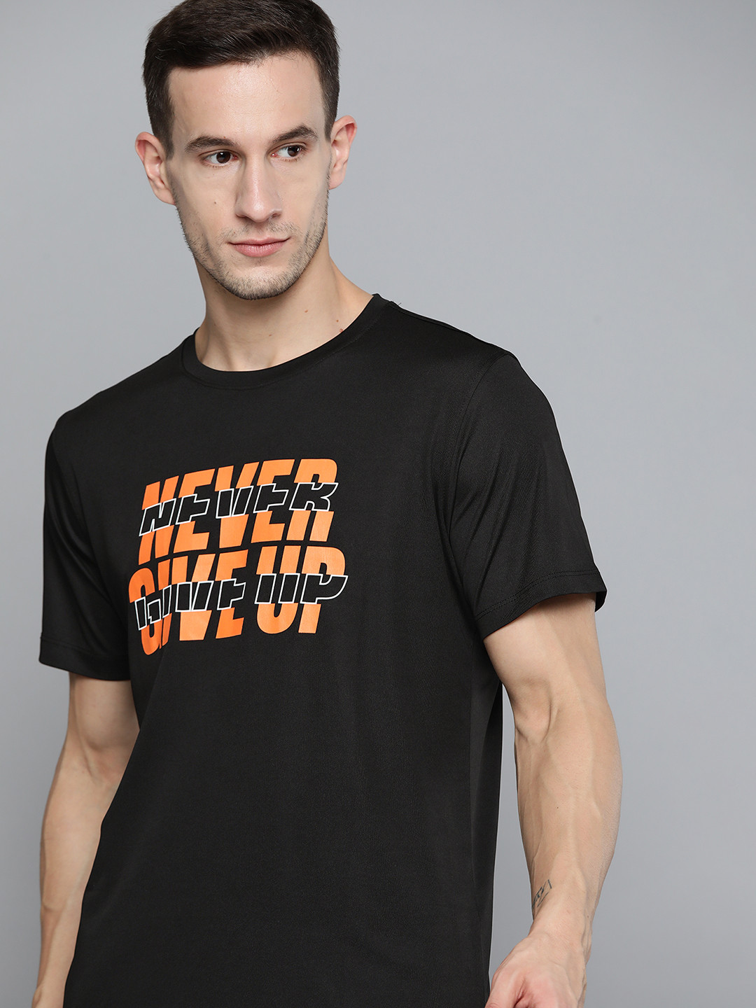 

HRX By Hrithik Roshan Training Men Jet Black Rapid-Dry Typography Tshirts