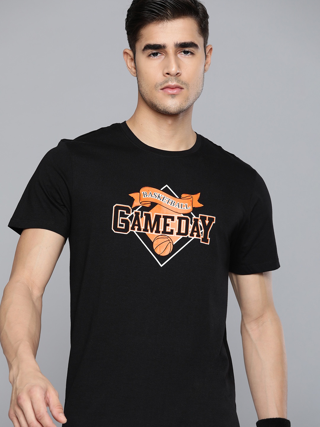 

HRX By Hrithik Roshan Basketball Men Jet Black Bio-Wash Graphic Tshirt