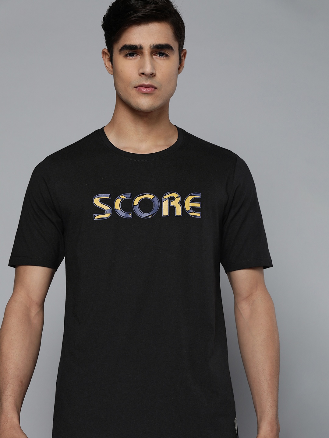 

HRX by Hrithik Roshan Men Jet Black Typography Print Bio-Wash Football T-shirt