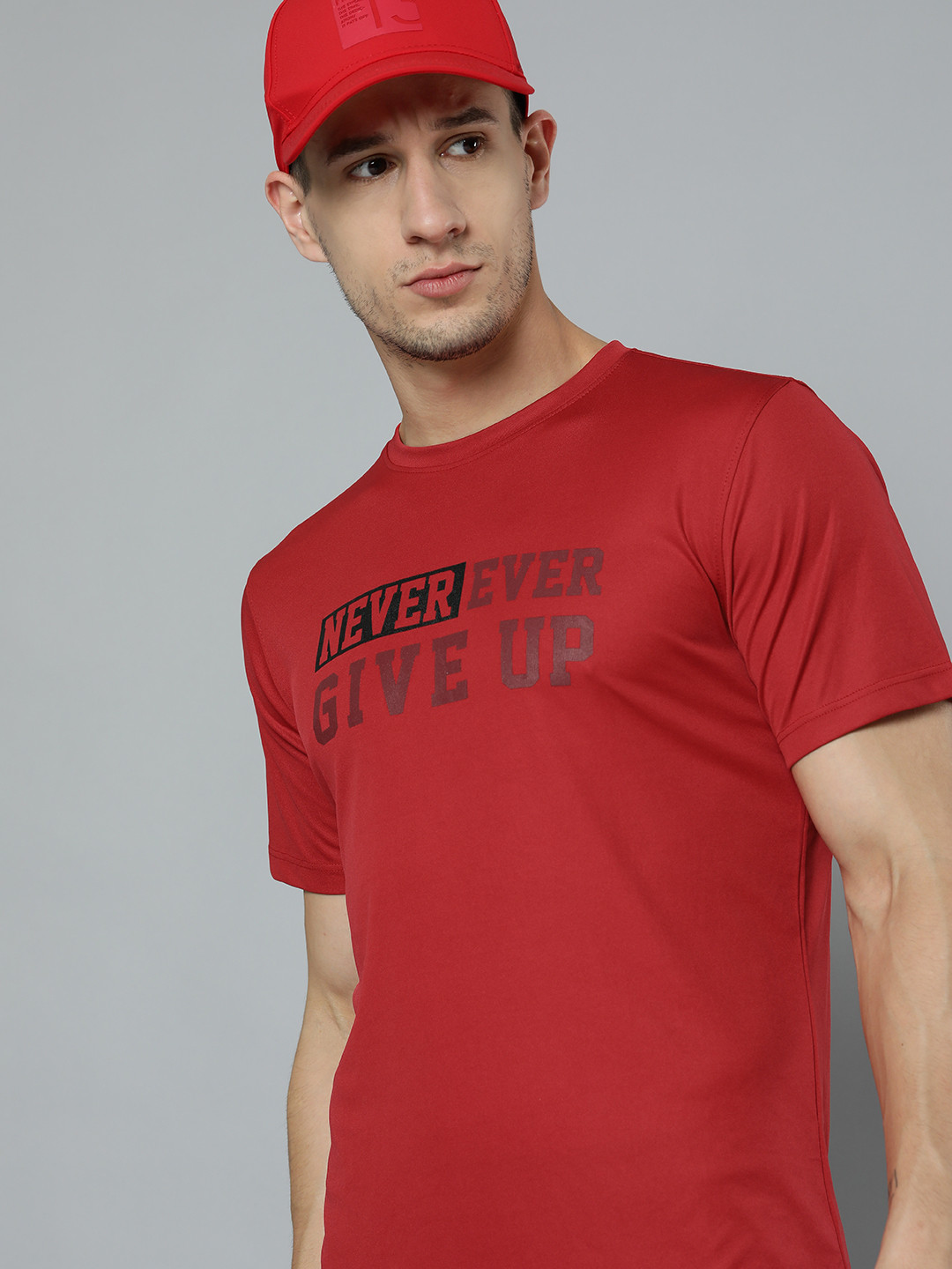 

HRX By Hrithik Roshan Training Men Formula Red Rapid-Dry Solid Tshirts
