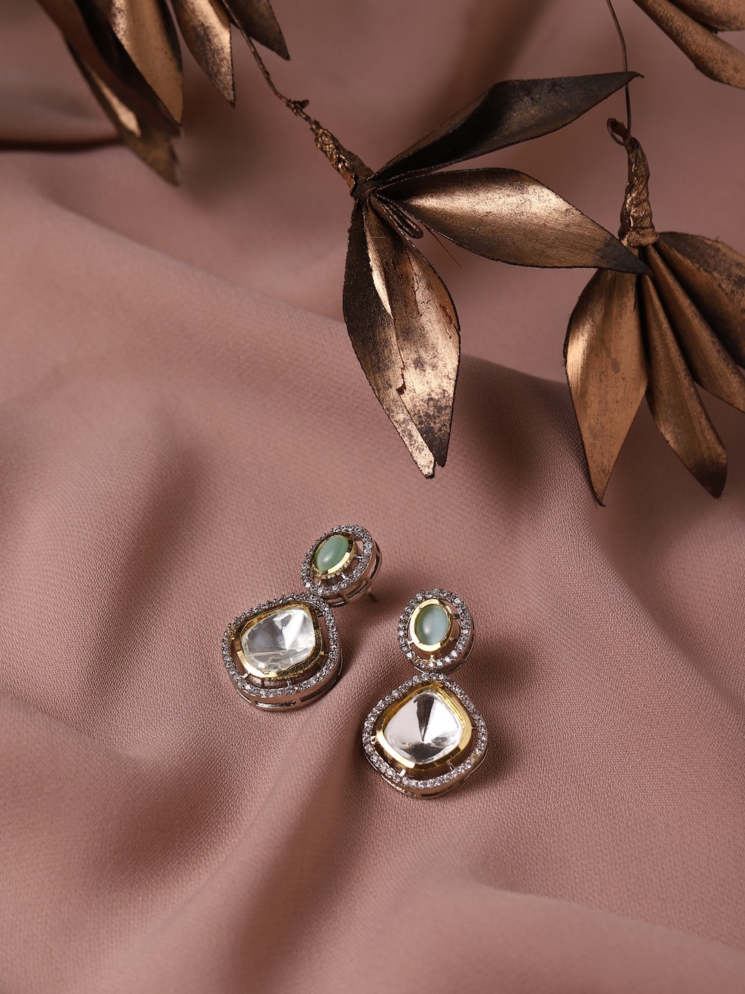 

RITU SINGH Silver-Toned Teardrop Shaped Studs Earrings