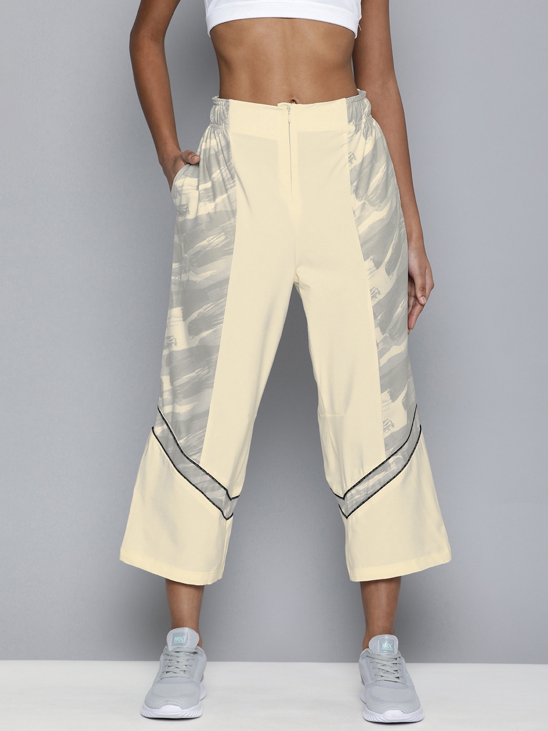 

HRX By Hrithik Roshan EDGE Women Natural Tan Rapid-Dry Printed Trousers, Cream