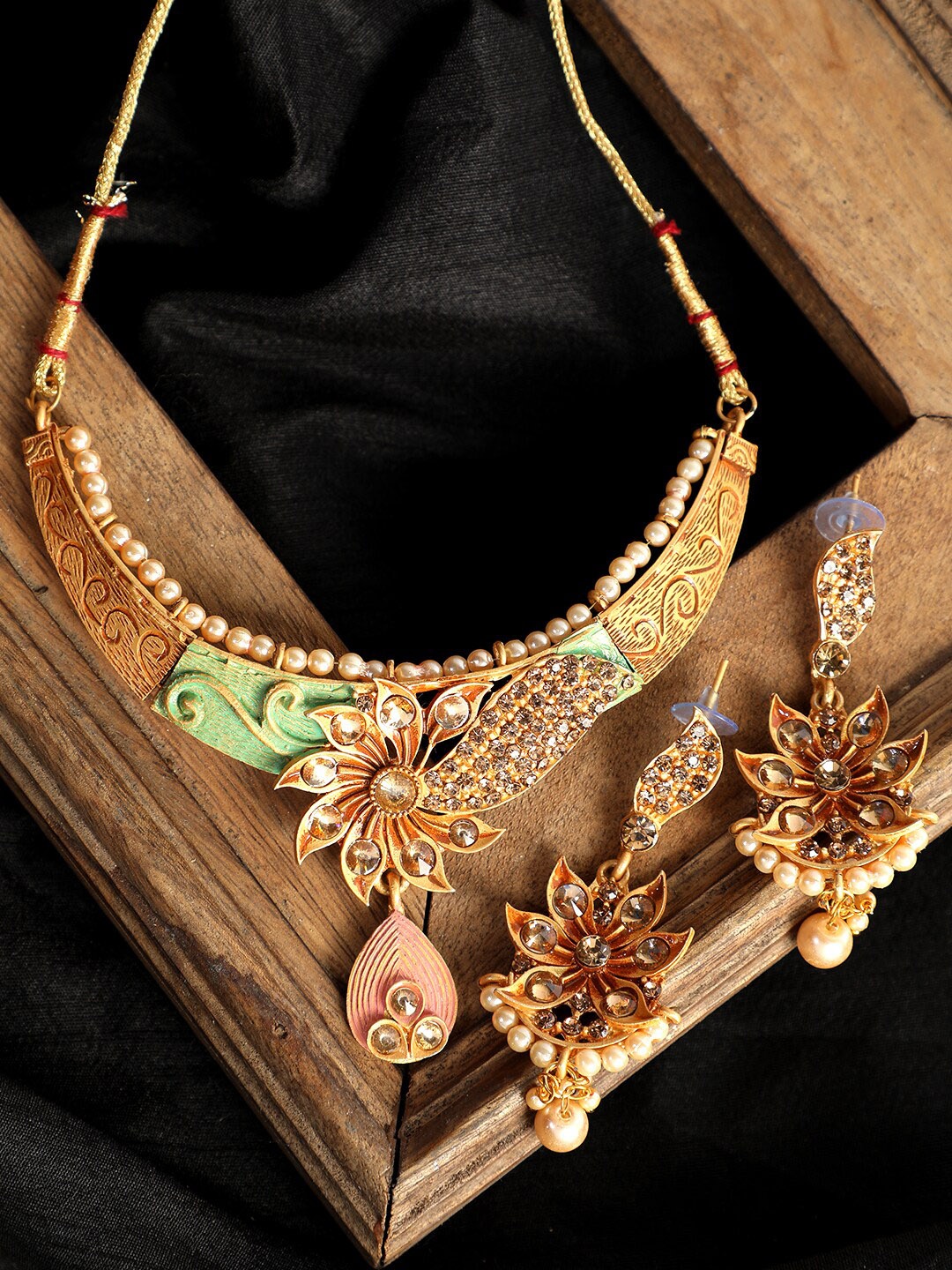 

ANIKAS CREATION Gold-Plated & White Stone-Studded Beaded Jewellery Set