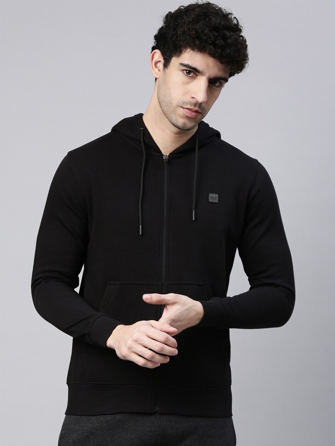 

Proline Active Men Black Solid Hooded Sweatshirt