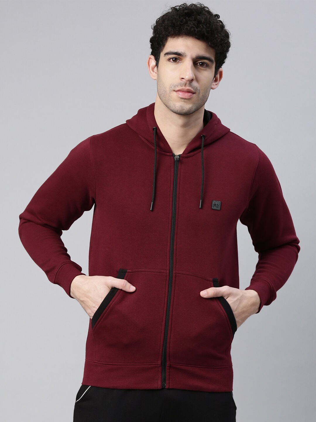 

Proline Active Men Maroon Solid Hooded Sweatshirt