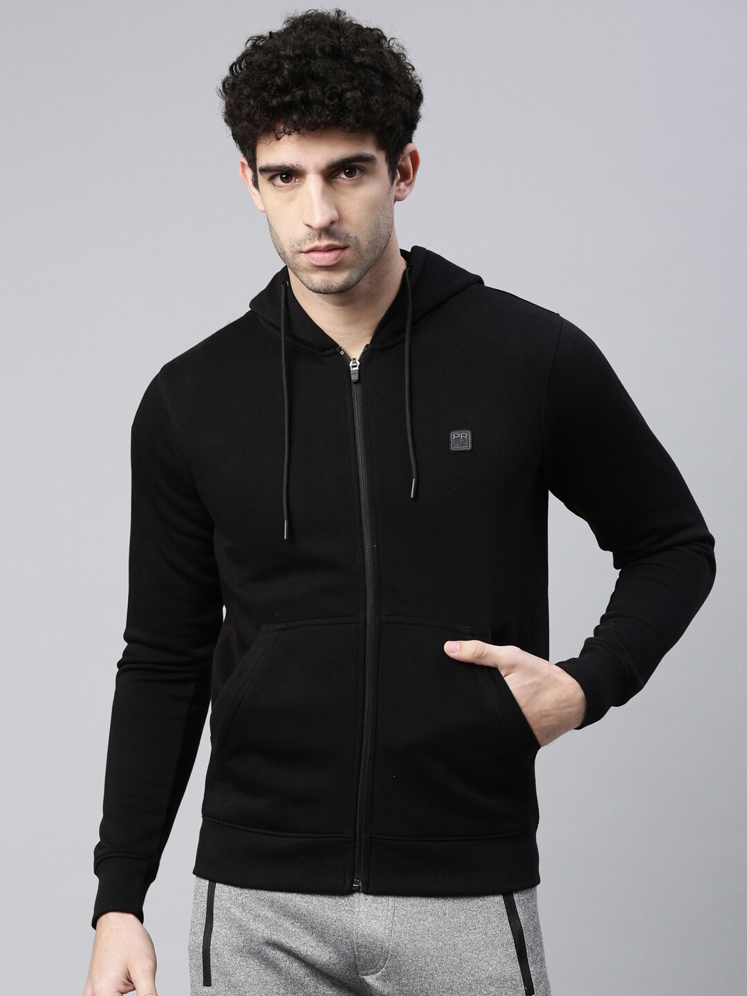 

Proline Active Men Black Solid Hooded Sweatshirt