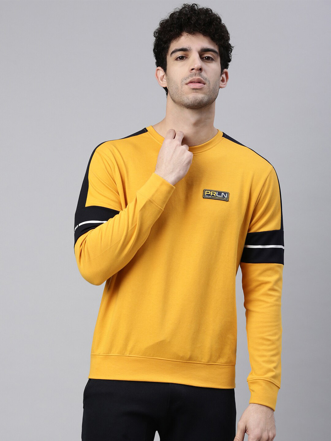 

Proline Active Men Yellow Solid Sweatshirt