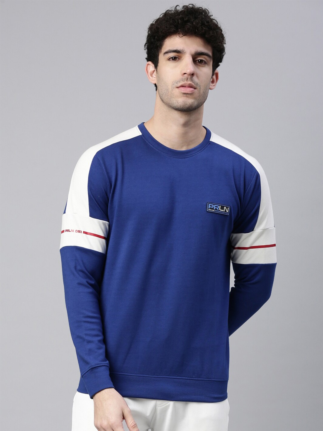 

Proline Active Men Blue and White Colourblocked Sweatshirt