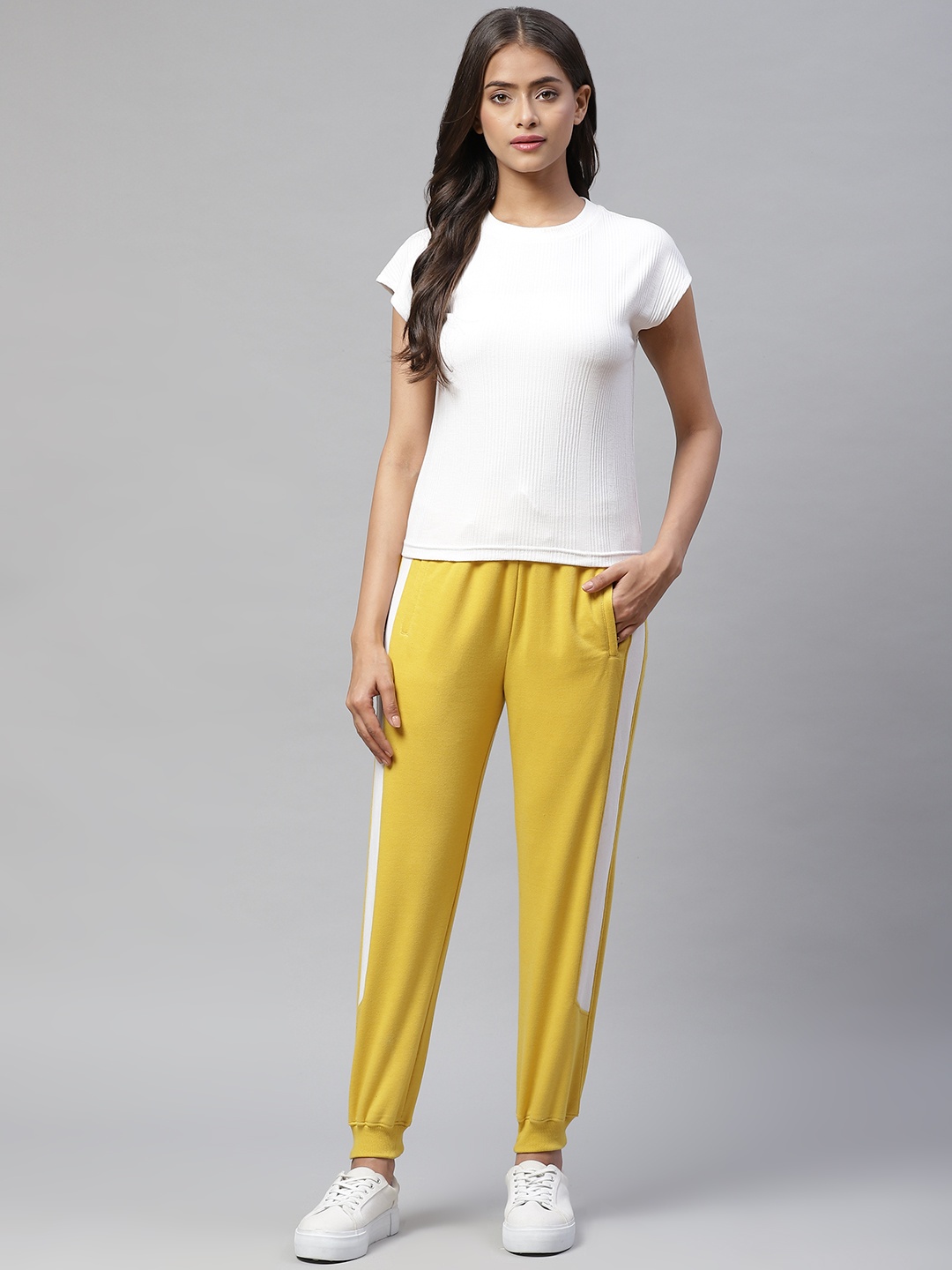 

Laabha Women White & Mustard Yellow Solid Tracksuit