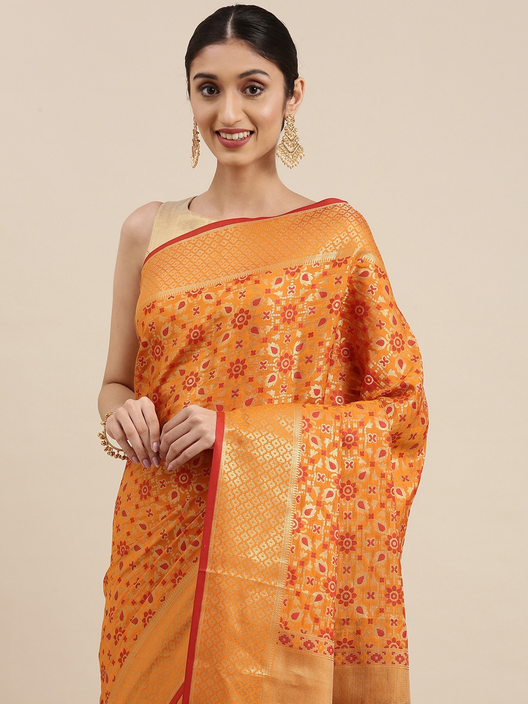 

Mitera Orange & Gold-Toned Ethnic Motifs Zari Silk Blend Patola Saree