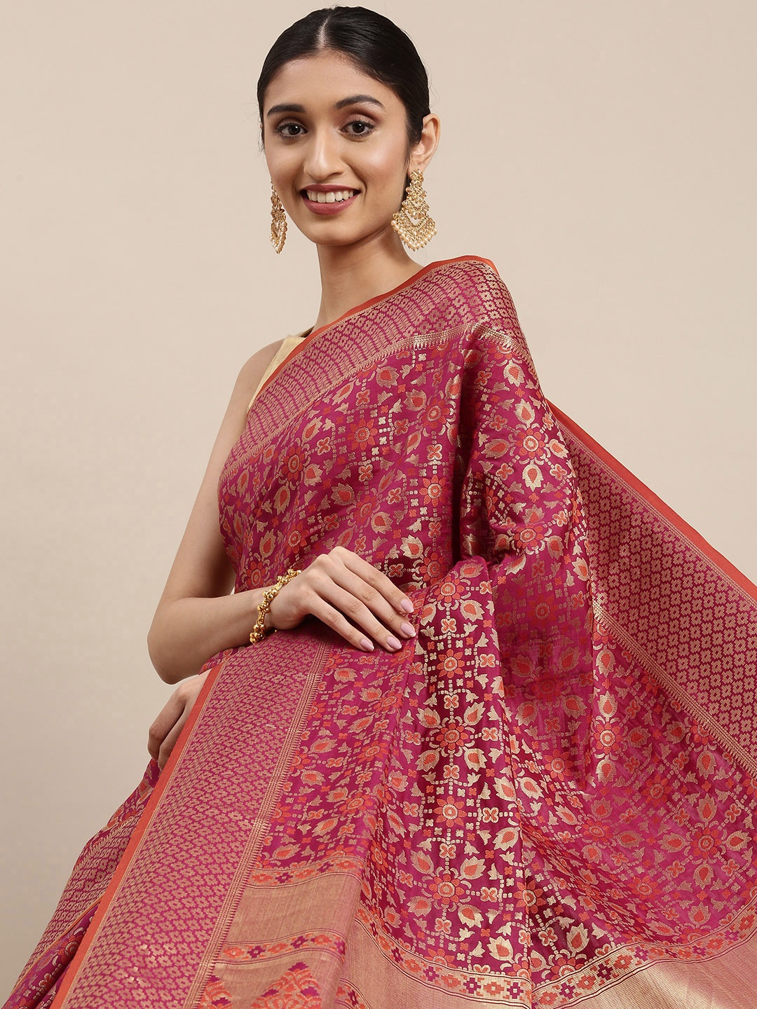 

Mitera Purple & Gold-Toned Ethnic Motifs Zari Silk Blend Patola Saree