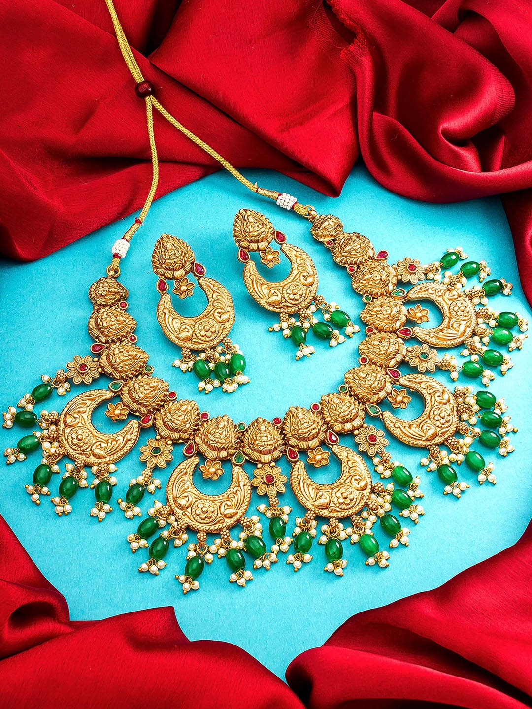

aadita Gold Plated & Green Studded Jewellery Set