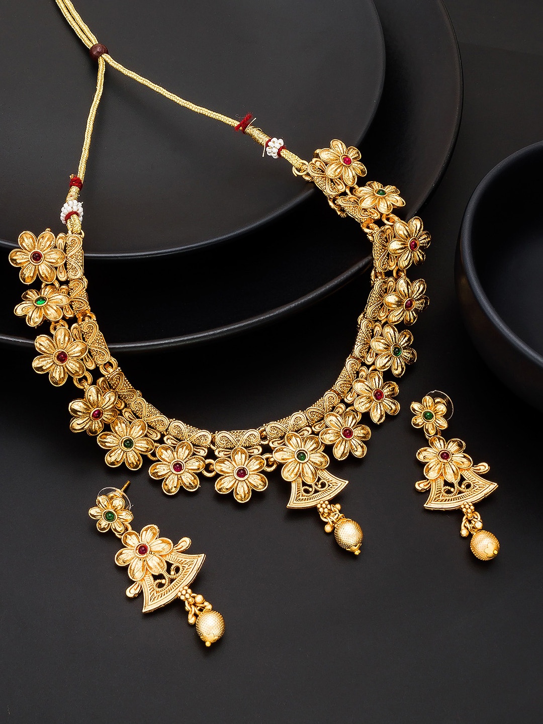

aadita Gold-Plated Stone-Studded Jewellery Set