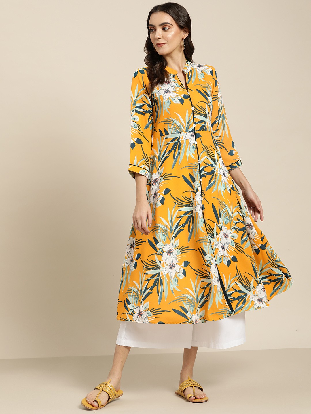 

Jompers Women Yellow & Teal Blue Floral Printed Floral Georgette Anarkali Kurta