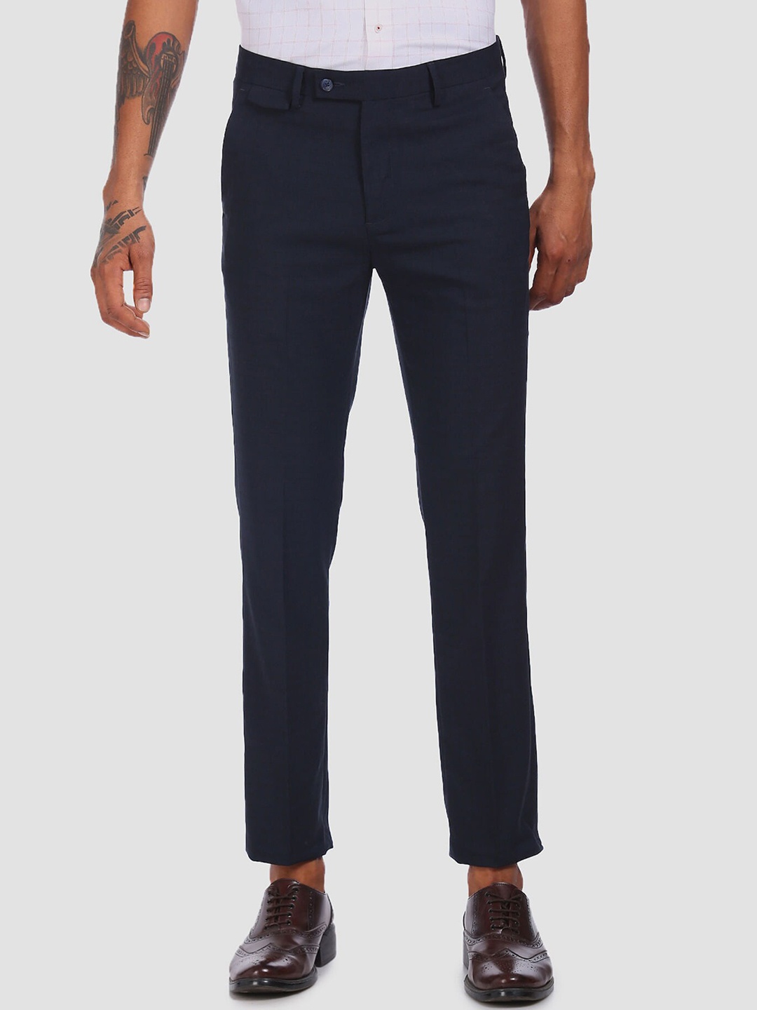 

Arrow New York Men Blue Solid Trousers
