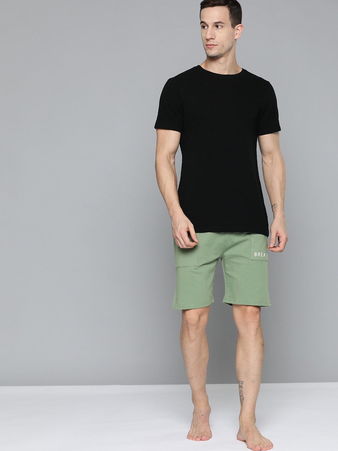 

HRX By Hrithik Roshan Yoga Men Jade Organic Cotton Solid Shorts, Green