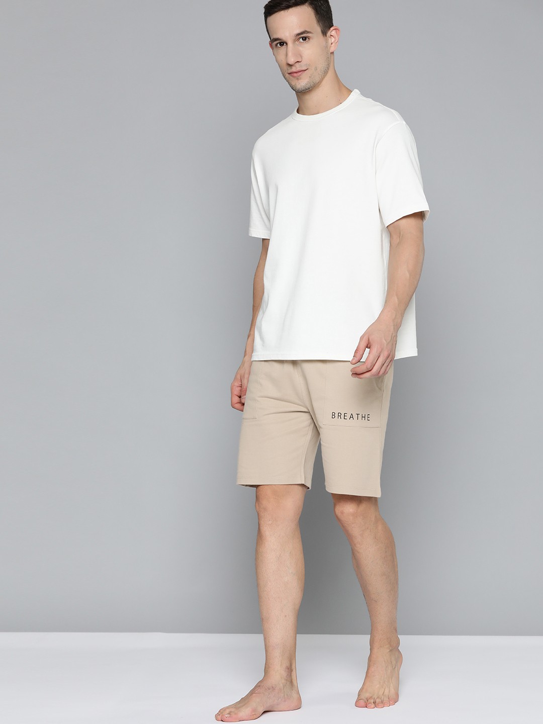 

HRX By Hrithik Roshan Yoga Men Myrobolan Organic Cotton Solid Shorts, Beige