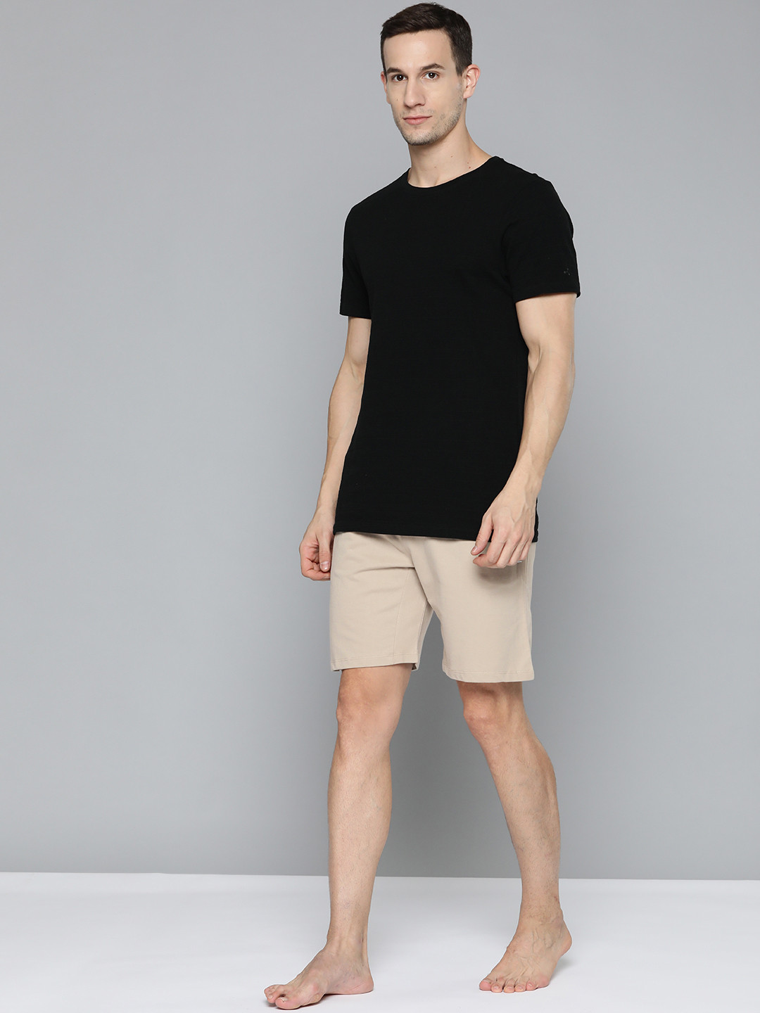 

HRX By Hrithik Roshan Yoga Men Myrobolan Organic Cotton Solid Shorts, Beige