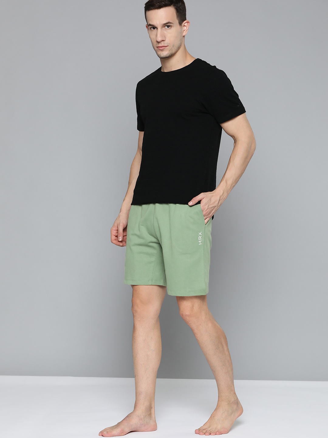 

HRX By Hrithik Roshan Yoga Men Jade Organic Cotton Solid Shorts, Green