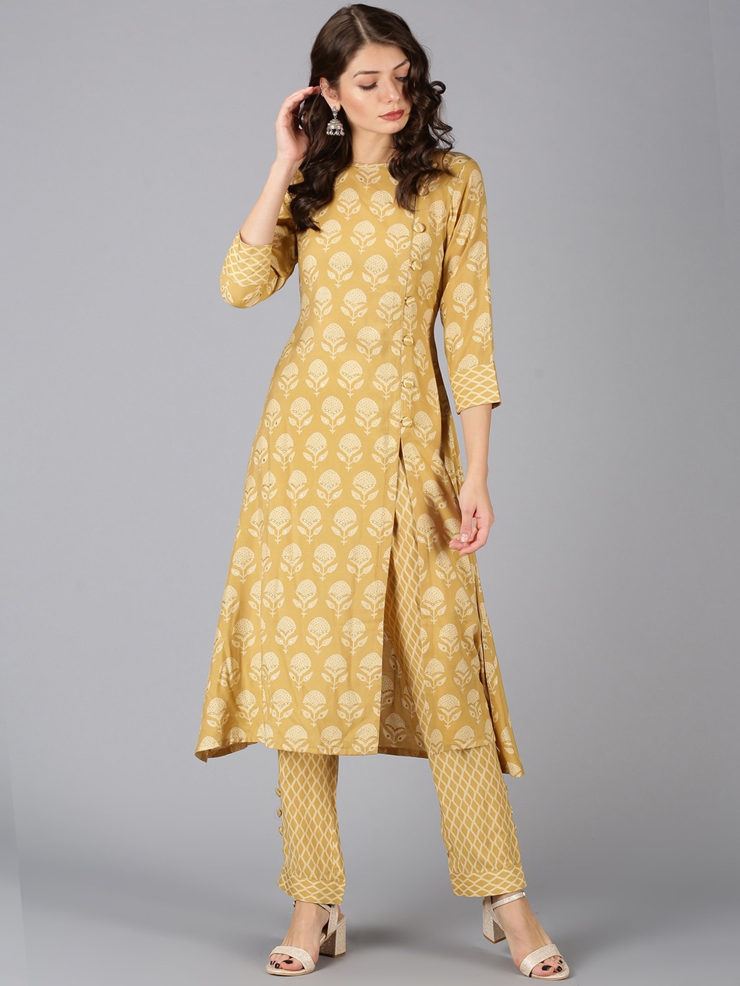 

MADHURAM Women Mustard Yellow Ethnic Motifs Printed Panelled Kurta with Trousers