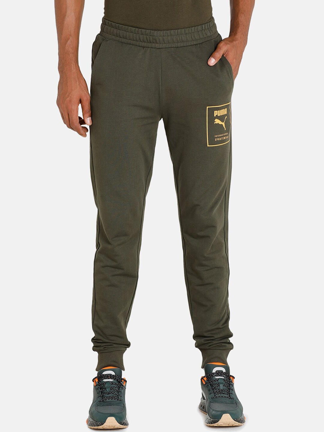 

Puma Men Green Solid Cotton Slim Fit Track Pants
