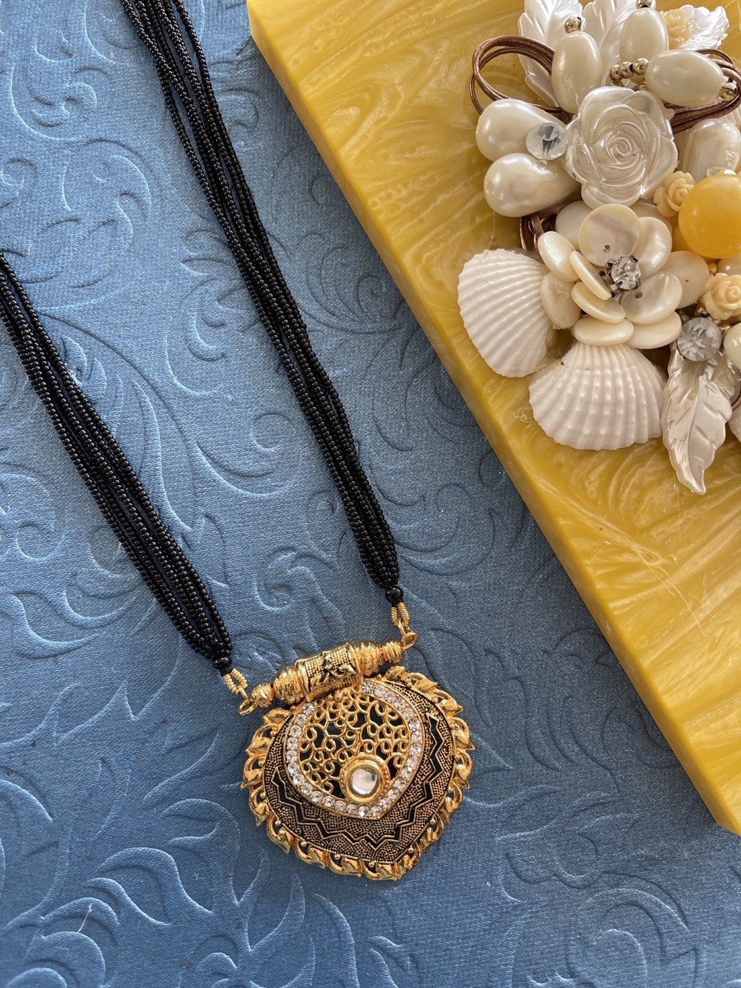 

Digital Dress Room Gold-Plated & Black-Beaded & White Stone-Studded Mangalsutra