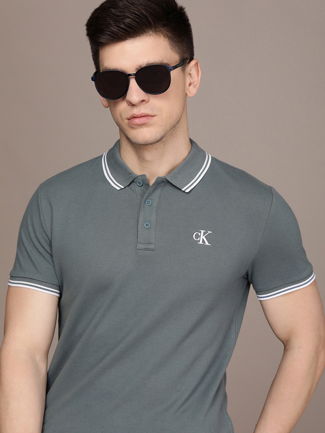 

Calvin Klein Jeans Men Blue Polo Collar Slim Fit T-shirt