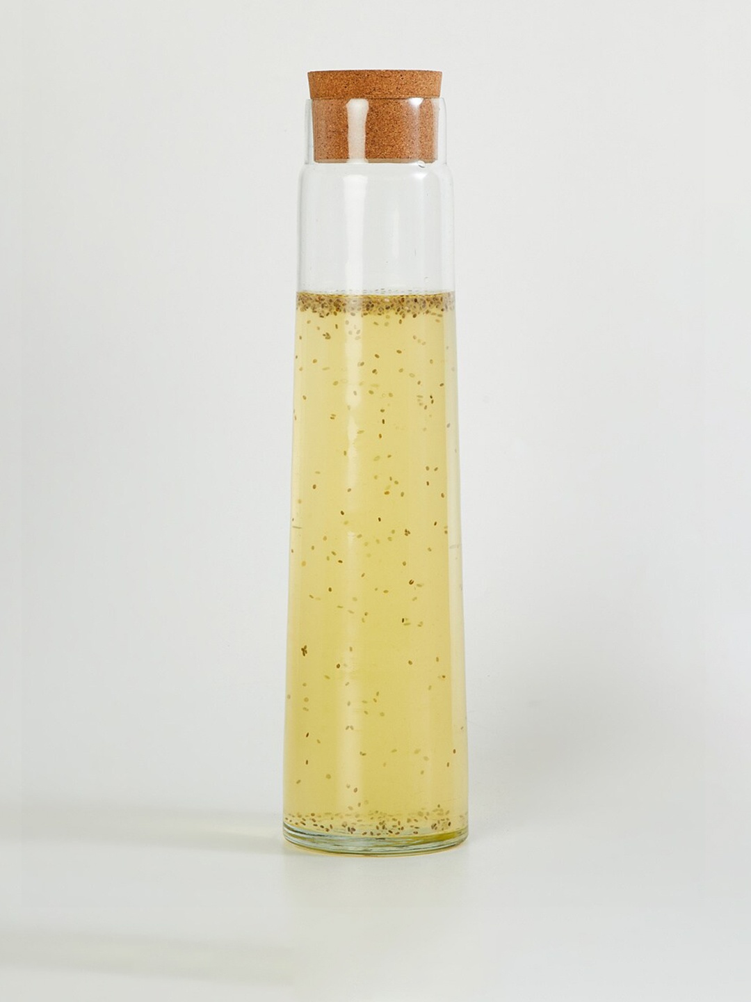 

Home Centre Transparent Mirage Glass Bottle With Wooden Stopper