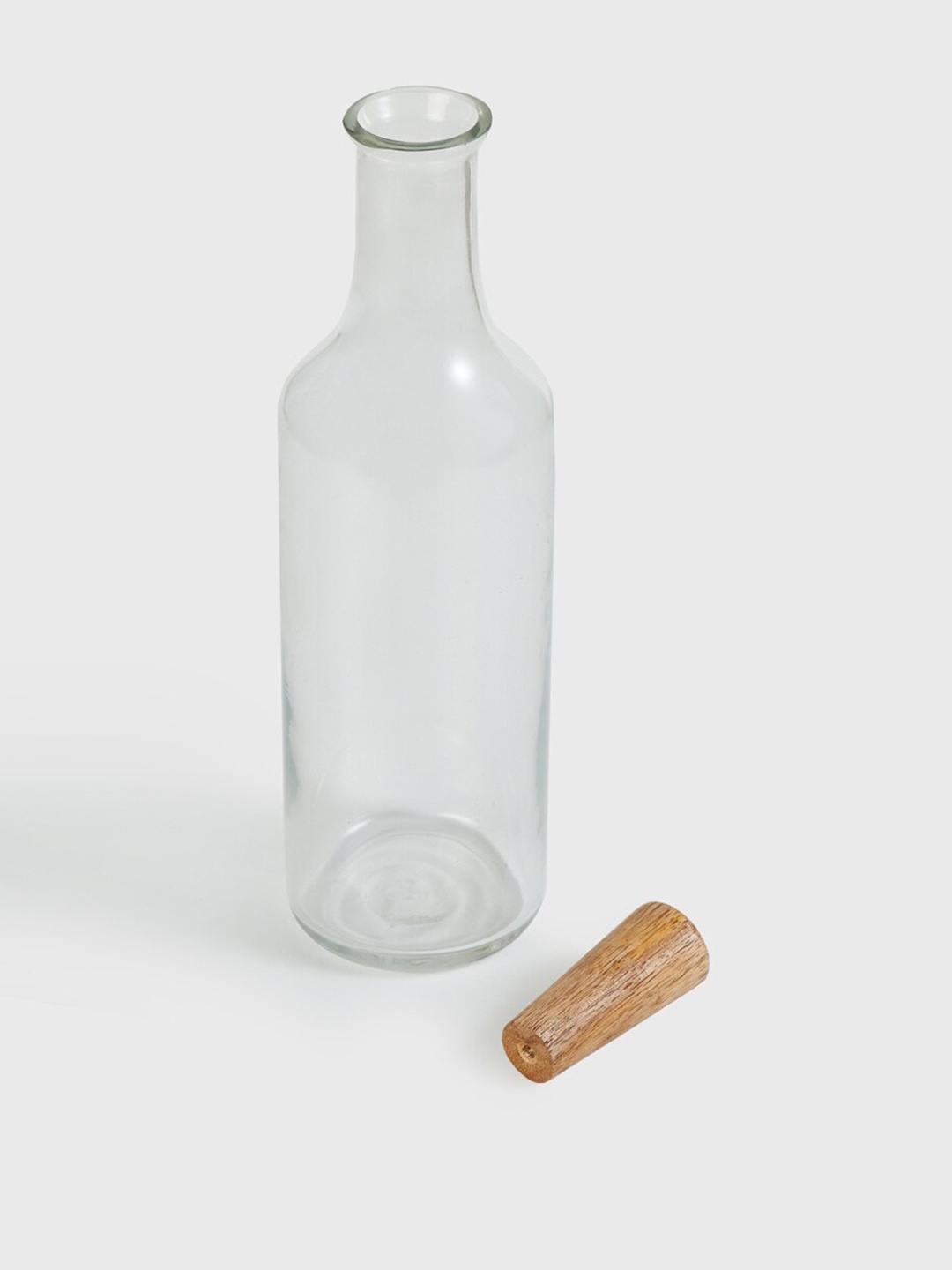 

Home Centre Transparent & Brown Solid Glass Water Bottle With Wooden Stopper