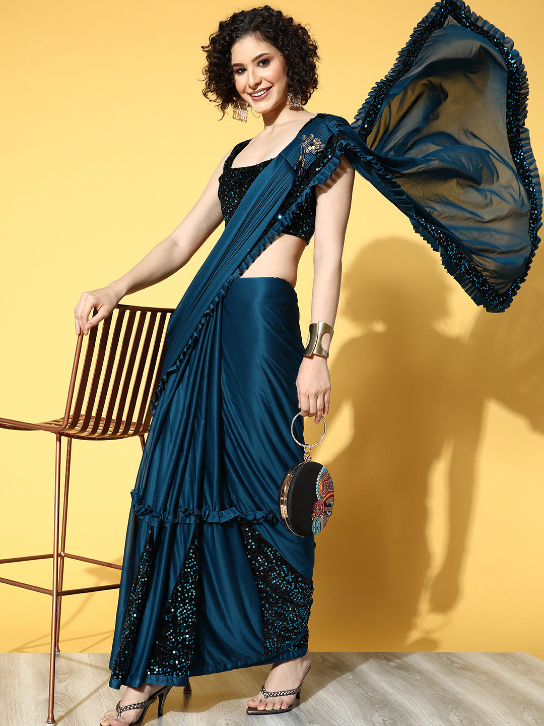 

Mitera Teal Embellished Sequinned Saree