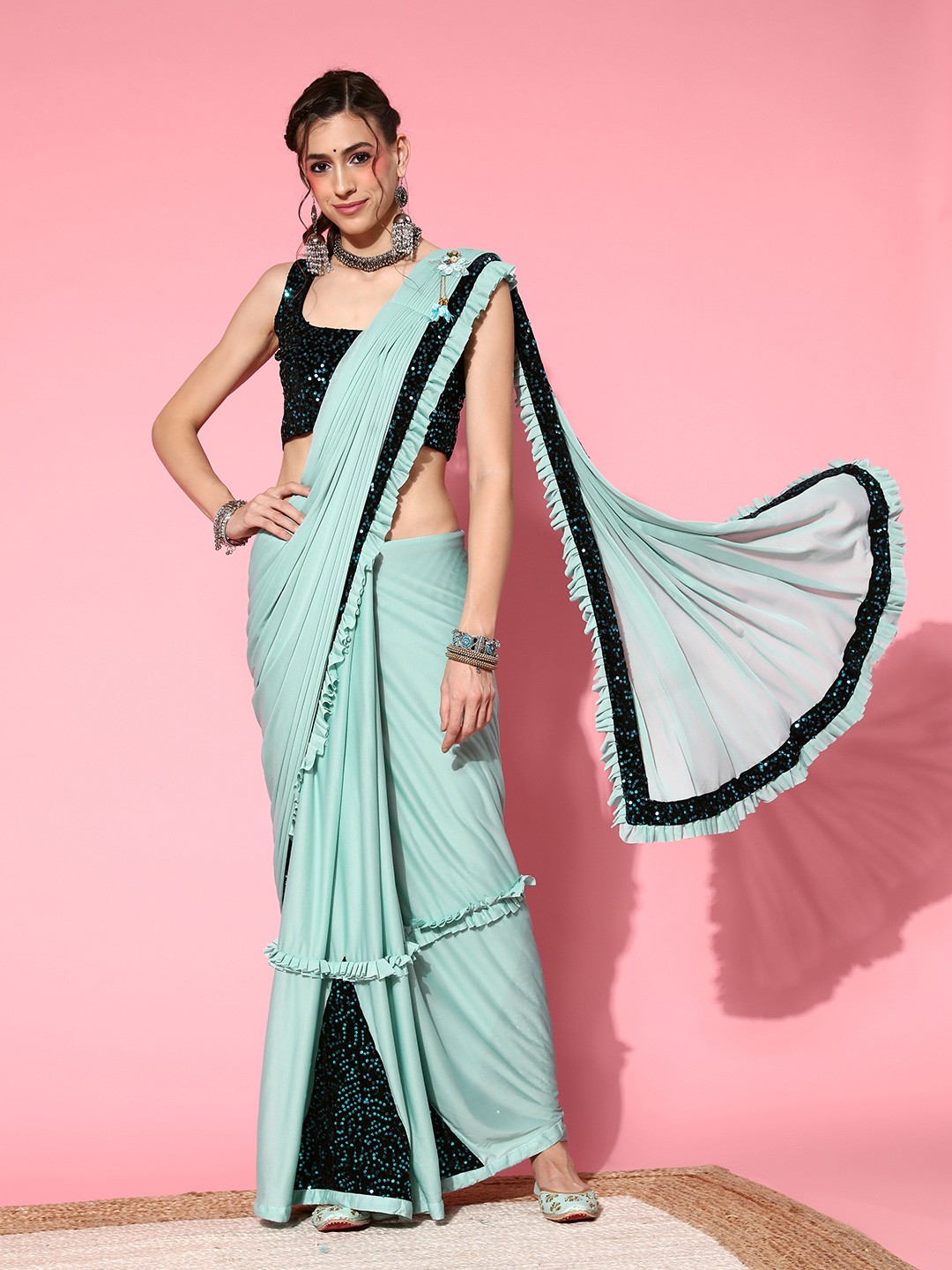 

Mitera Turquoise Blue Embellished Sequinned Saree