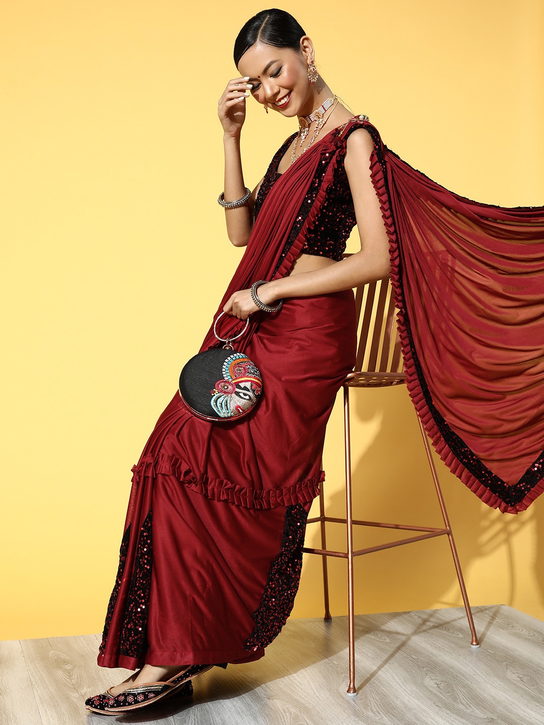 

Mitera Maroon Embellished Sequinned Saree