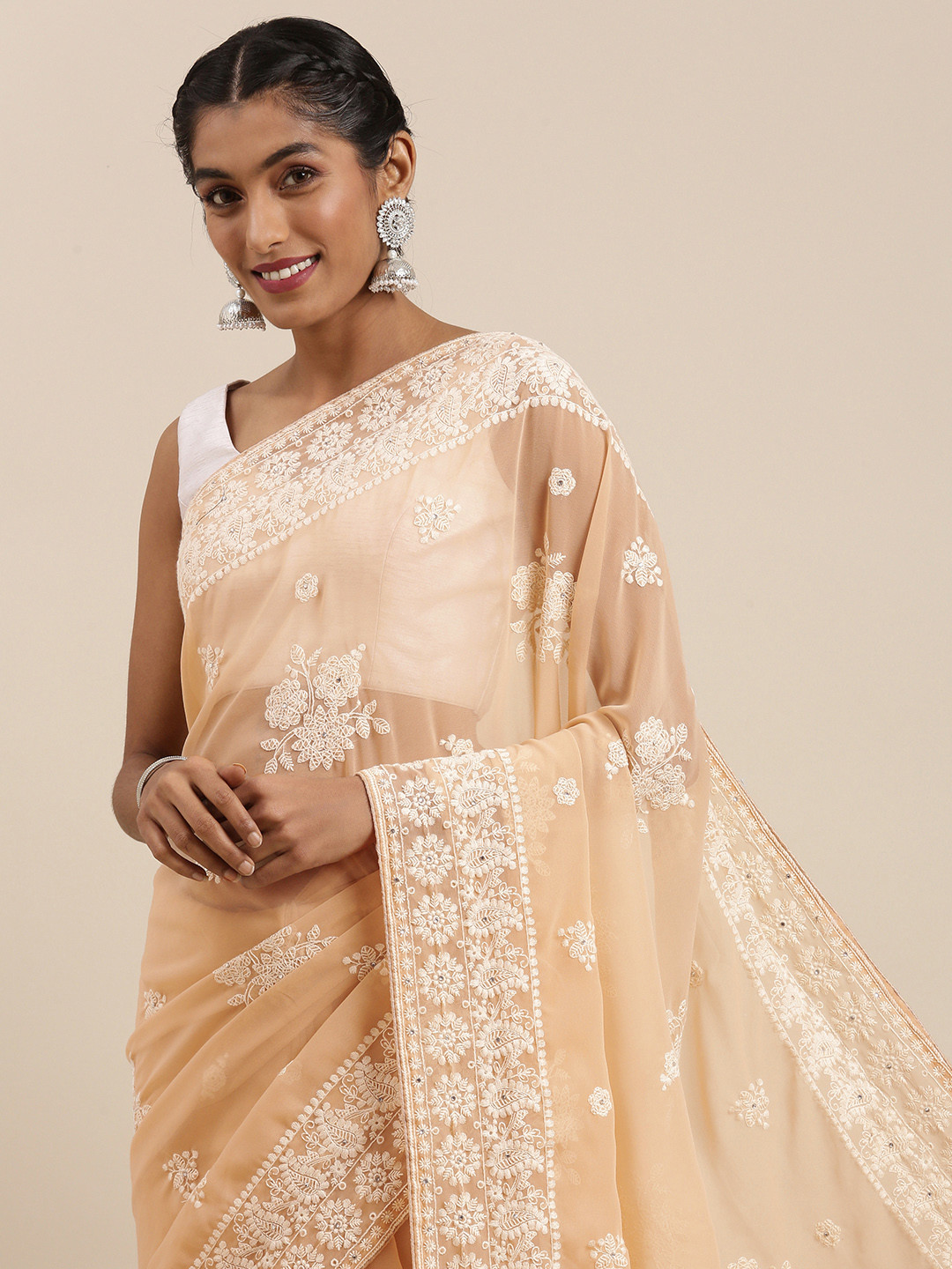 

Mitera Cream-Coloured & White Ethnic Motifs Embroidered Pure Georgette Saree